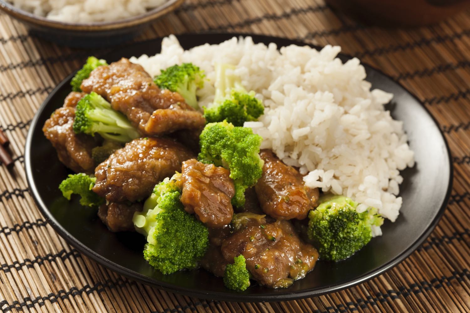 Rice dish with meat and broccoli.